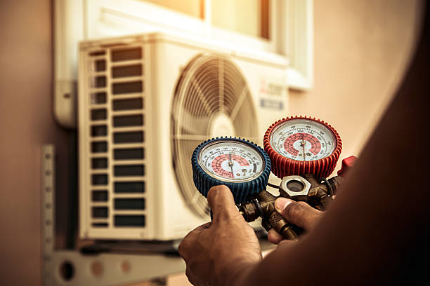Professional Ac Installation technician working in Swisher, IA